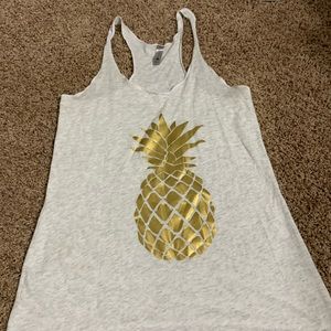 next level gold pineapple tank top
